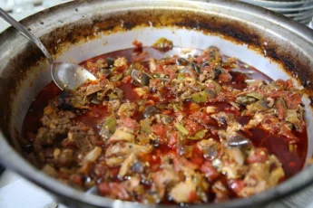 Recipe of Round of non-veal stuffed with peppers and spices for tacos.