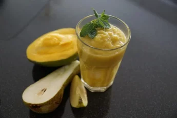Recipe of Mango, banana and tangerine smoothie with garrilache