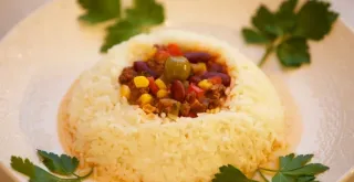 Receta de Arroz de conejo al horno con trompetas de la muerte.