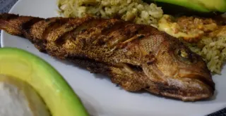 Recipe of Baked sea bream with paprika crust and baked potatoes.